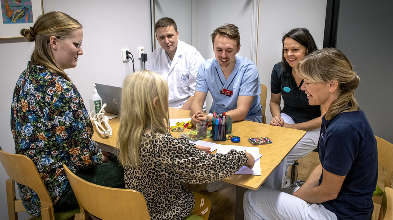 Vårdteam-möte med patient